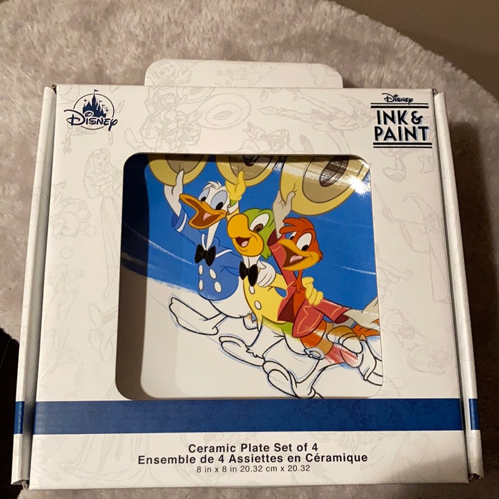 Disney ink and paint set of four plates